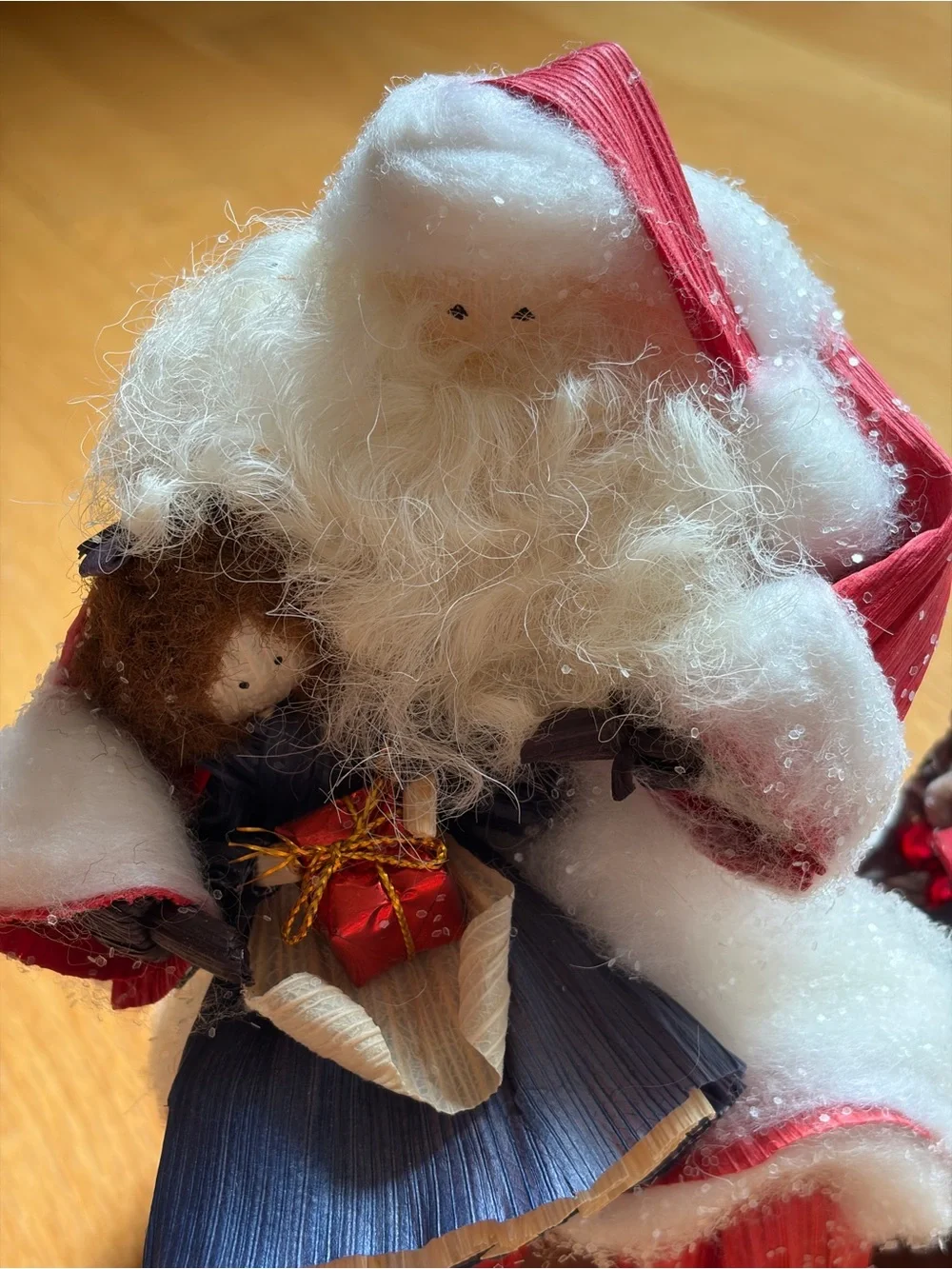 vintage nan’s cornhusk doll santa with child on lap